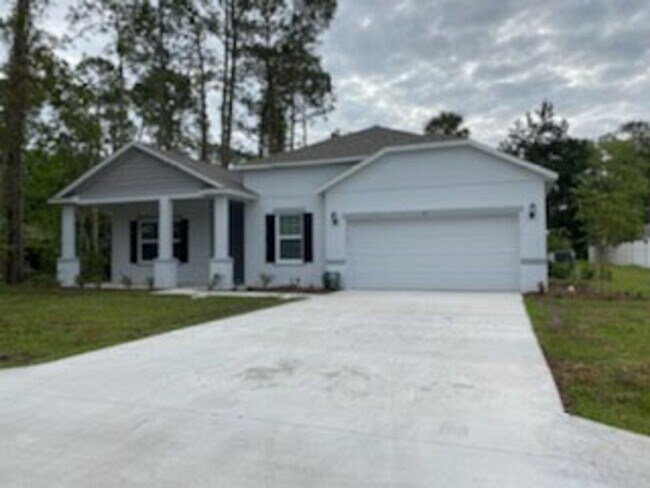 Building Photo - Like New 3 bedroom + den with French doors...