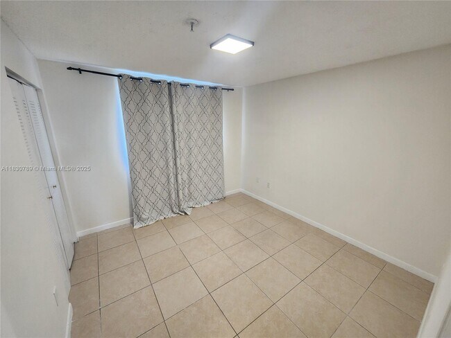 Building Photo - 7905 W 30th Ct