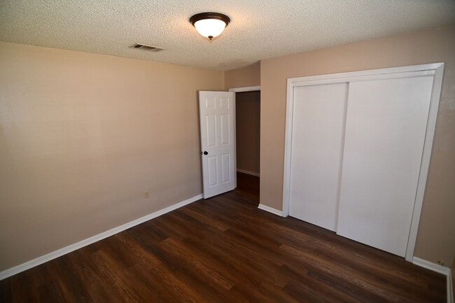 Building Photo - Location! Location!  Newly updated, 4 bedroom, 2 bath home near Perkins & Essens