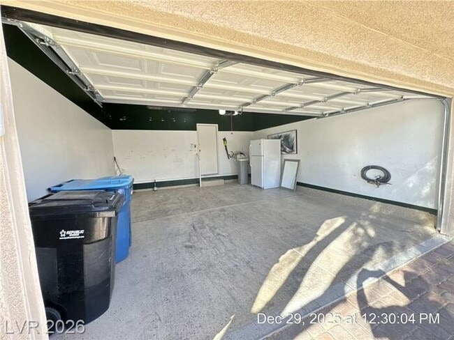 Building Photo - Cozy Gated Townhome with Private Yard, 2-Car Garage & Community Pool!
