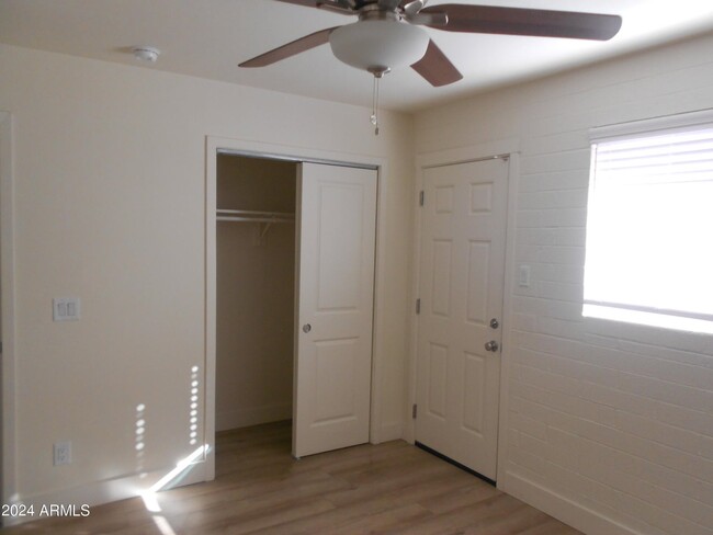 Bedroom with exit to private back patio - 3151 N 36th St