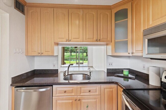 Building Photo - 9470 Poinciana Pl