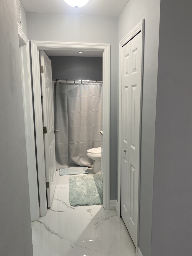 Hallway from Kitchen to 2nd bathroom - 5351 29th St SW