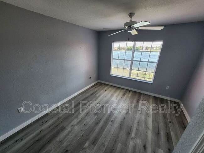 Building Photo - 9232 Lake Chase Island Way