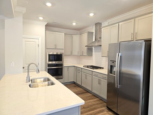 Building Photo - Brand New 5 Bedroom 3 Bathroom Single Family Home with guest suite and 1st floor office w/ FREE h...