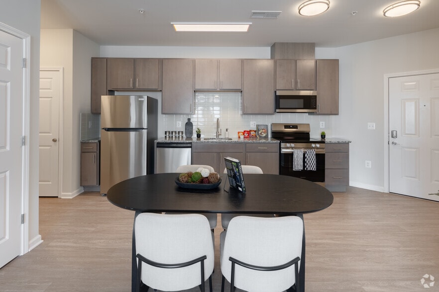 2BR, 2BA - 911SF - Kitchen - Joyfield Flats at Woodbridge