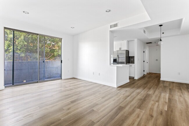 New walnut LVP floors - 900 S Harvard Blvd