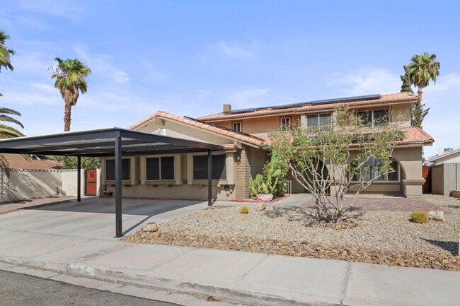 Building Photo - Welcome to your entertainers dream home with solar and pool service included!