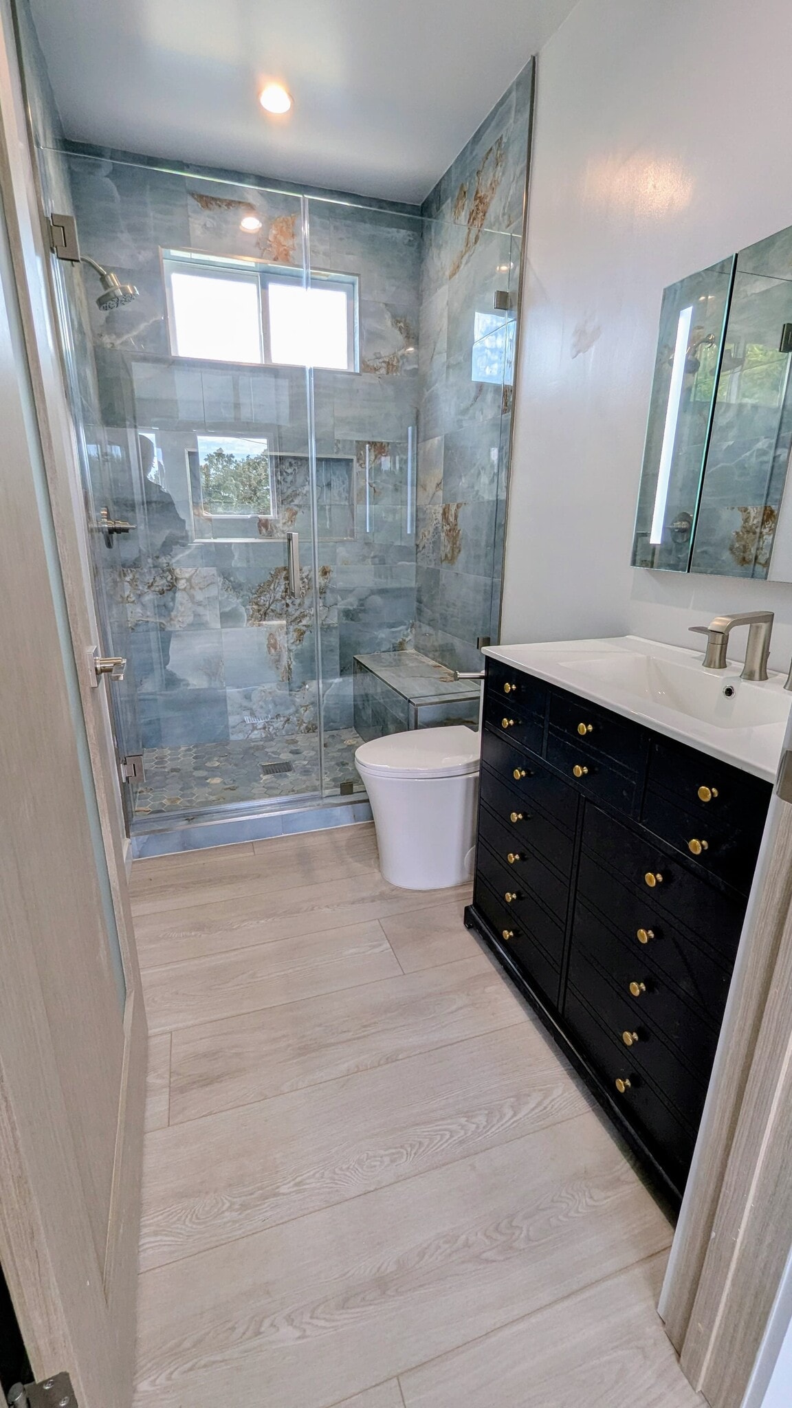Spa-like Bathroom with Glass Shower Doors - 3355 Virginia Ave