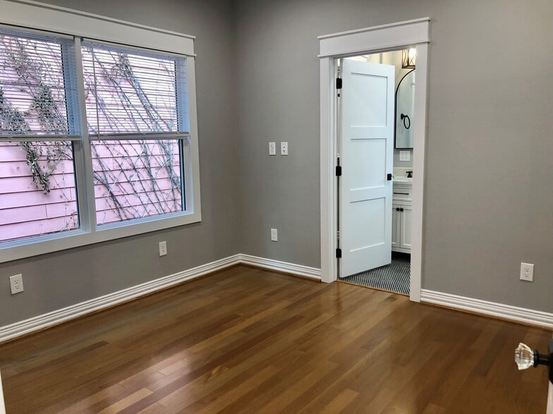 bedroom with private bathroom - 1928 Harold St