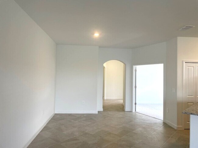 Building Photo - New Construction 2 Bedroom PLUS a Home Office Available in Lorraine Lakes