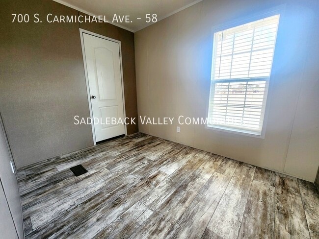 Building Photo - 700 S Carmichael Ave