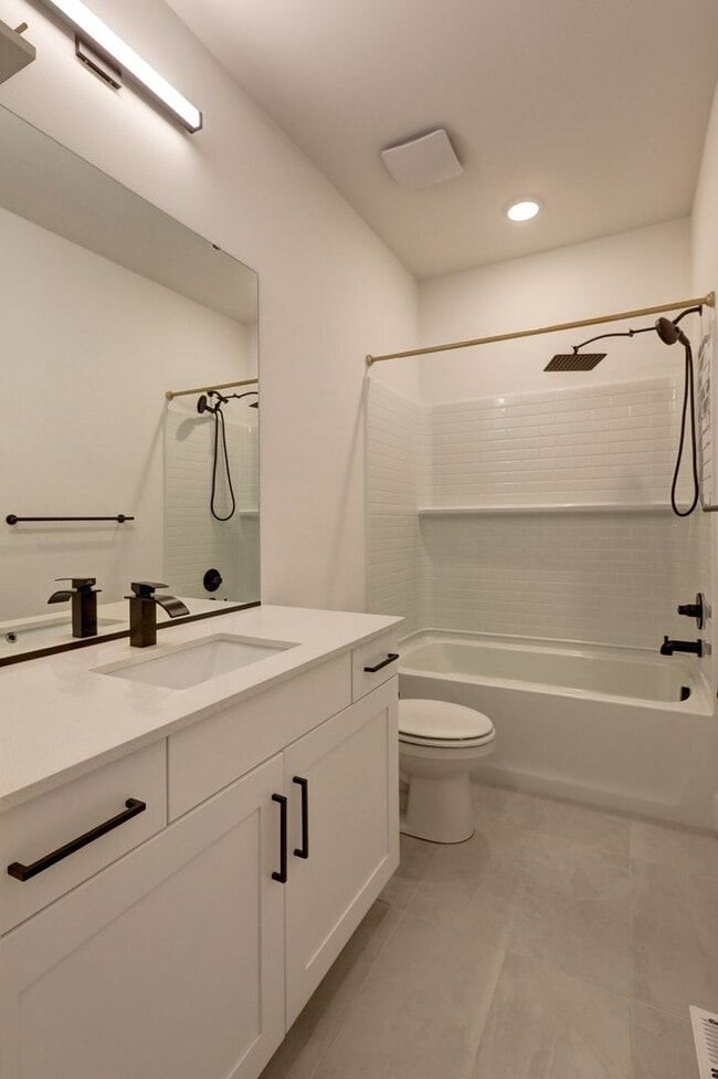 Building Photo - Live Where Style Meets Convenience – 2BR Townhome + Garage