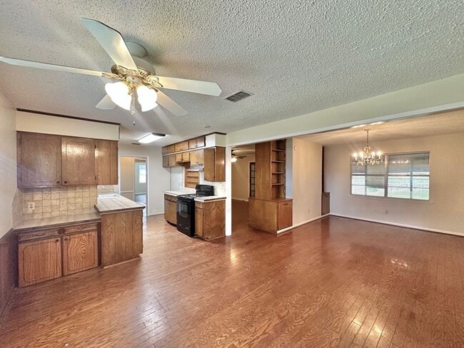 Building Photo - Spacious 4-Bedroom Home on a Corner Lot wi...