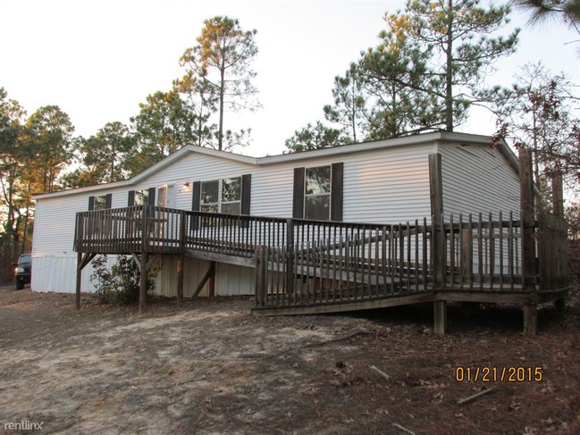 Building Photo - 3 br, 2 bath Mobile Home - 810 Woodtrail Dr