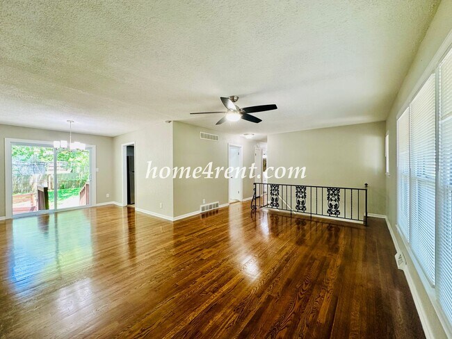 Building Photo - Updated Raytown Ranch w/ Wood Floors, SS Appliances, Finished Basement and a Fenced Yard!