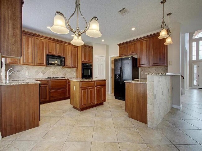 Building Photo - 15410 Cambria Cove