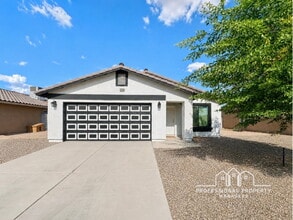 Building Photo - 4-bedroom, 2-bathroom home in Desert Sands