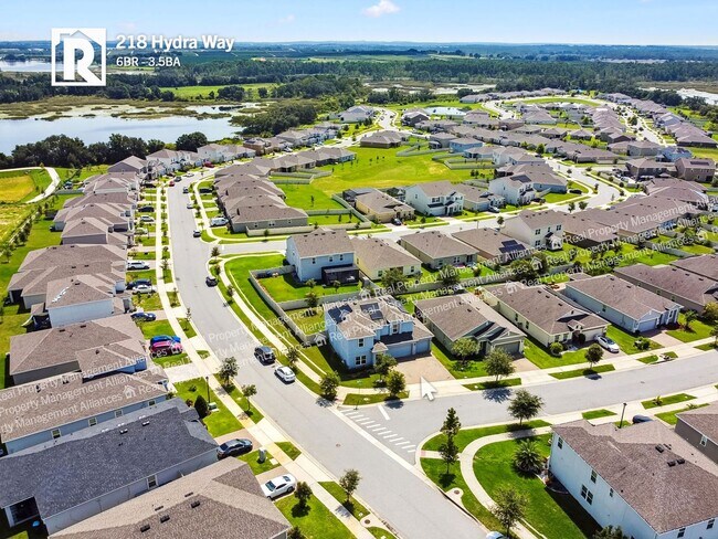 Building Photo - Spacious 6-Bedroom Home with Fenced Backya...