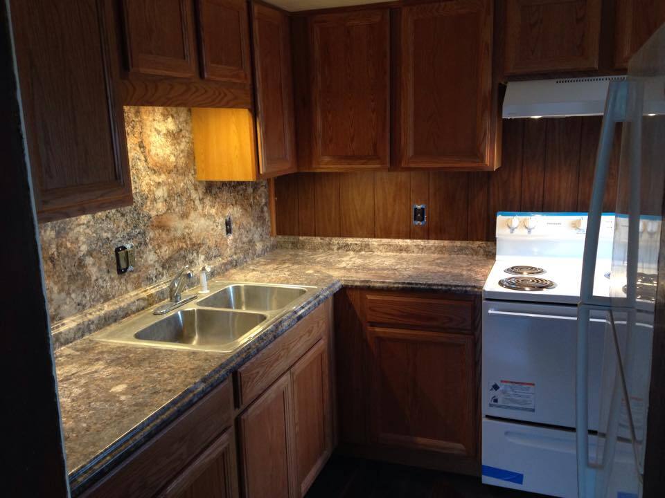 Kitchen sink, cabinets, stove - 924 E Main St