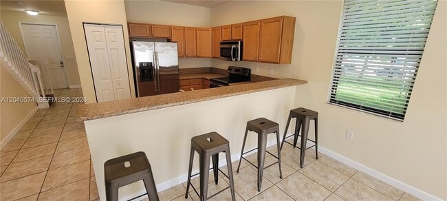 Building Photo - 8872 W 35th Ct