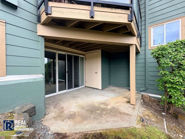 Building Photo - Prime Tacoma Narrows Condo with Covered Parking & Patio