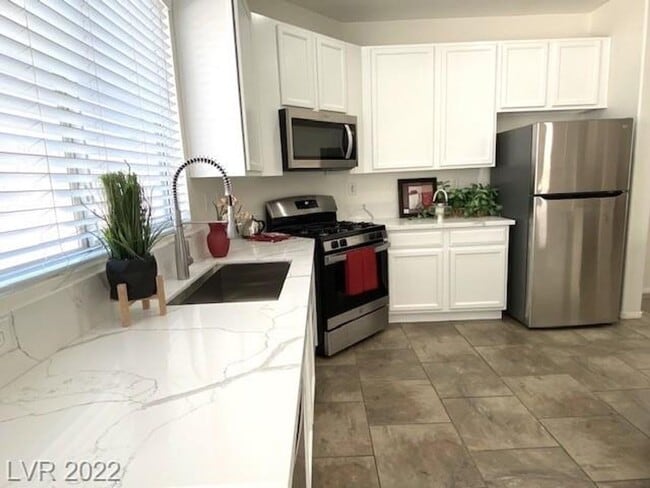 Building Photo - Available NOW. Gorgeous SW Las Vegas 4 bed...
