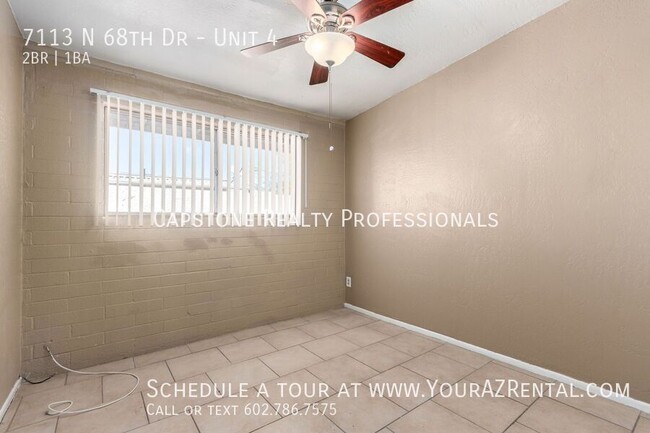 Building Photo - 7113 N 68th Dr