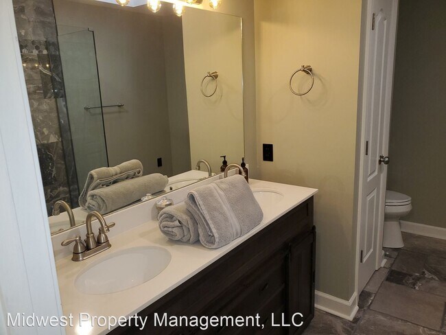 Building Photo - 3 br, 2.5 bath House - E 100-11 Green Mead...
