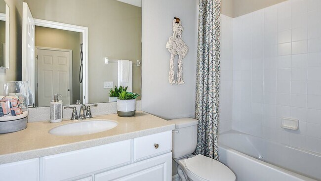 Second full bath comes with closet space and large mirror. Total 3 baths. - 1074 Amber Leaf Trail