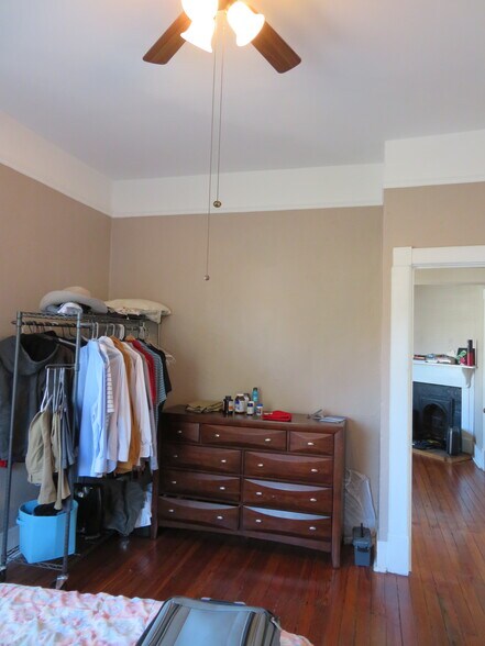 Occupied Back bedroom (note clothes rack) - 1217 Java Pl
