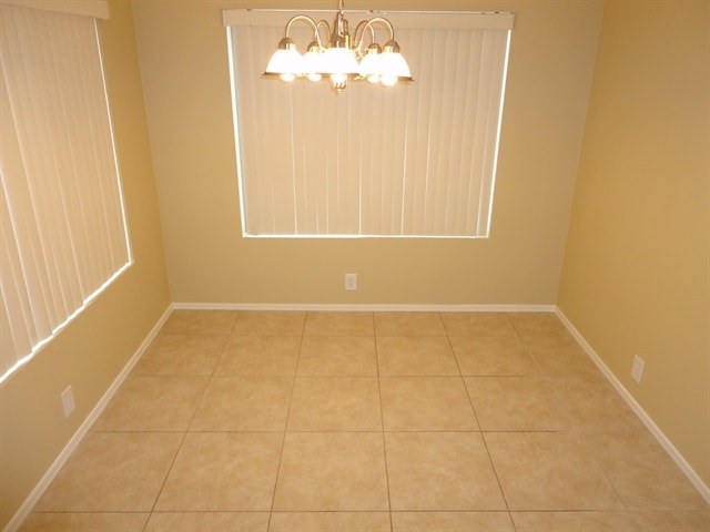 Building Photo - 10657 E Enid Ave