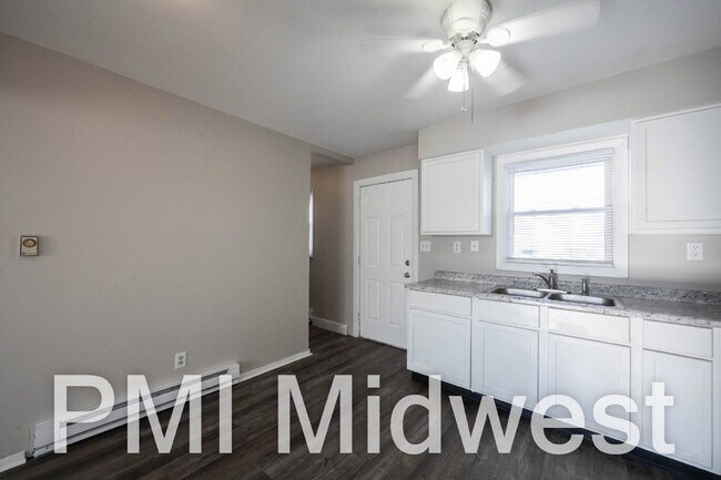 Building Photo - "Cozy 2-Bed Oasis in New Palestine with 800 Sq Ft of Comfort!"