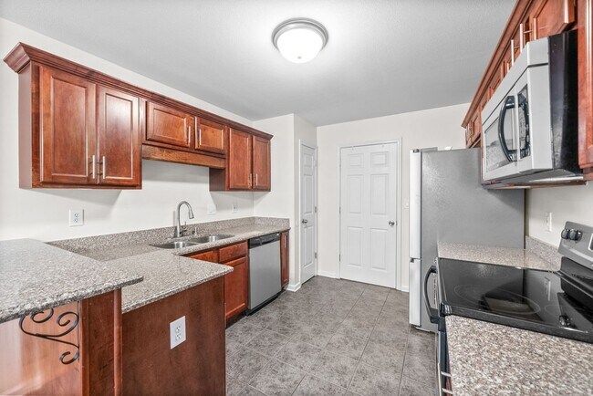 Building Photo - Pet Friendly Three Bedroom with Bonus!