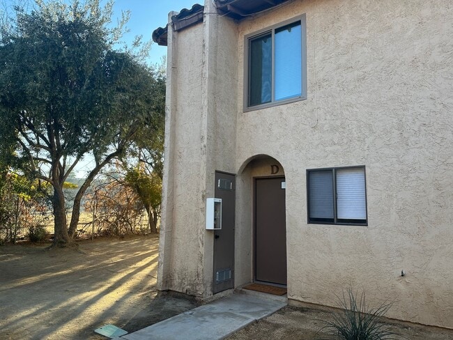 Building Photo - 2+1.5 REMODELED BRAND NEW APPLIANCES INCLUDED