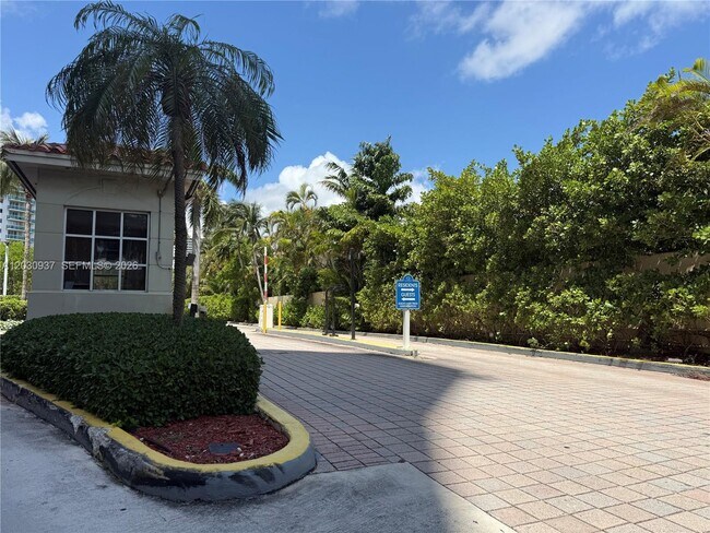 Building Photo - 19380 Collins Ave