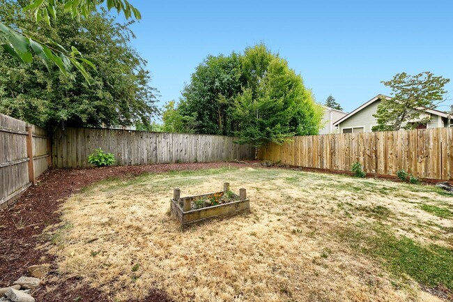 Building Photo - Custom-Built 4BR/2.5BA Two-Story Near Woodstock — Quartz Island Kitchen, Gas Fireplace & Fenced Y...