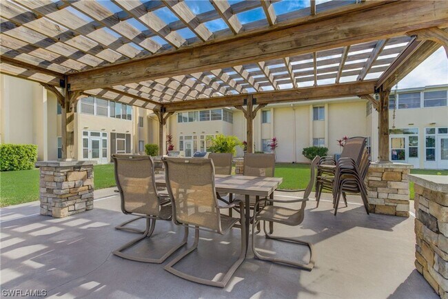 Building Photo - 55+ Charming first-floor condo nestled in the serene Fairways 3 Condominiums