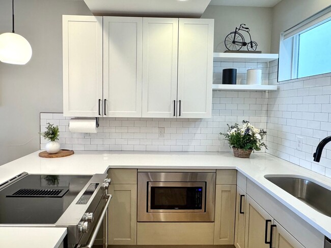 Building Photo - 1788 W 32nd Ave