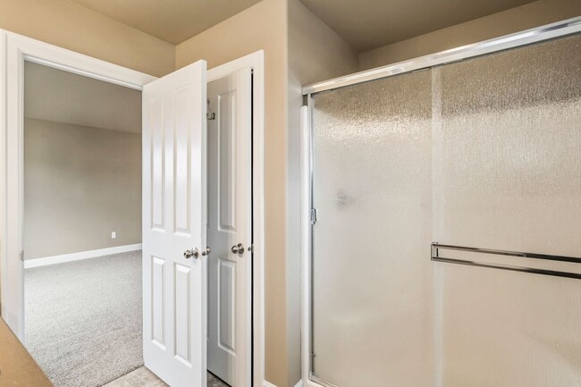 Building Photo - Spacious 4-Bedroom Home with New Paint & Carpet, Fenced Yard