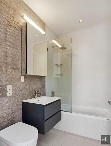 Building Photo - Renovated Lower East Side 1-Bedroom with M...