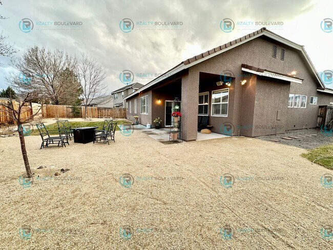 Building Photo - Open Kitchen, Expansive Living, and Covered Patio in Tranquil South Reno Near Trails, Parks & Sho...