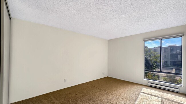 Building Photo - Morning Sunlight for this Courtyard-Facing...