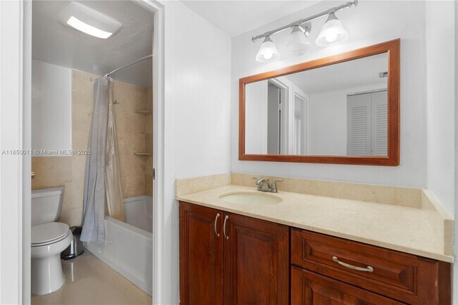 Building Photo - 3675 N Country Club Dr