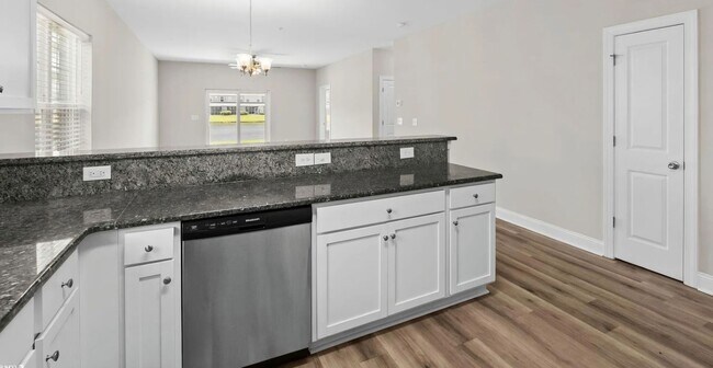 Building Photo - First Floor Comfort Meets Picture Perfect Pond Views