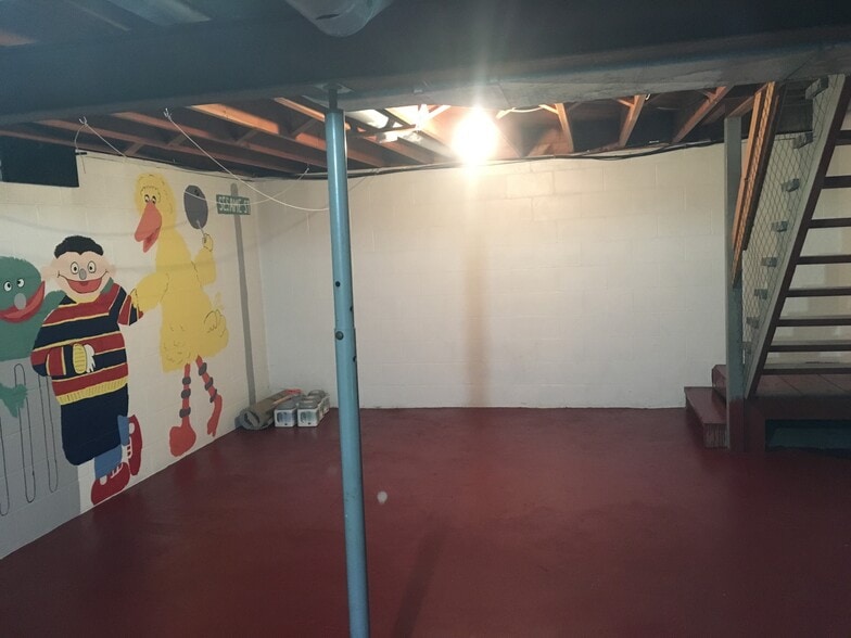 Full basement with hookups. - 607 Hood St