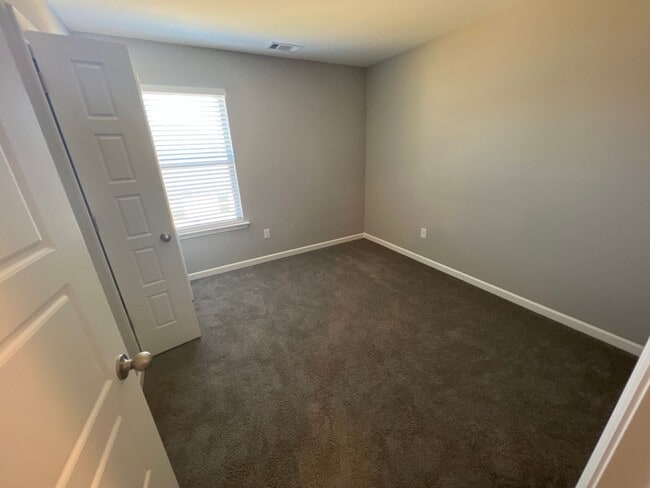 Building Photo - 4 bed, 2.5 bath house in Atoka built in 2022 now offering a move in gift card