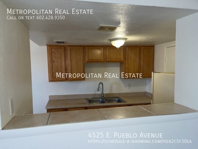 Building Photo - 4525 E Pueblo Ave