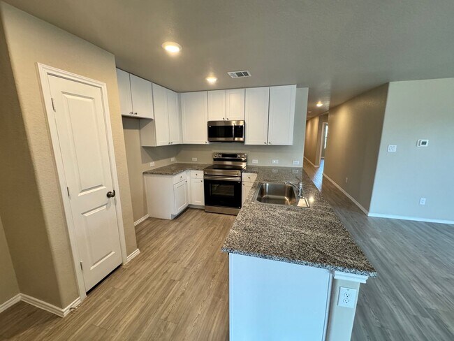 Building Photo - Move-In Ready Modern Home with Open Layout...