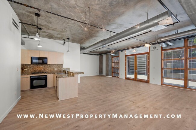 Building Photo - Expansive East Village loft at Parkloft, a...